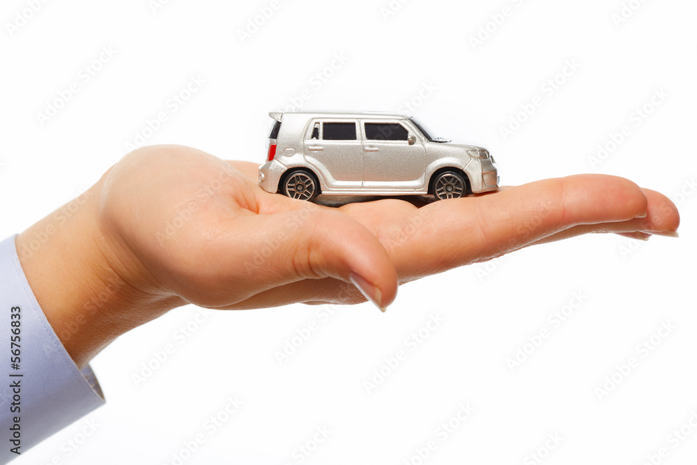 Hand with car.