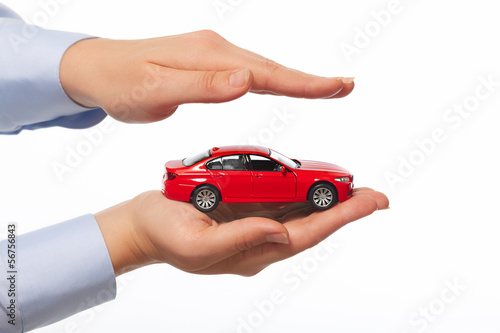 Hand with car.