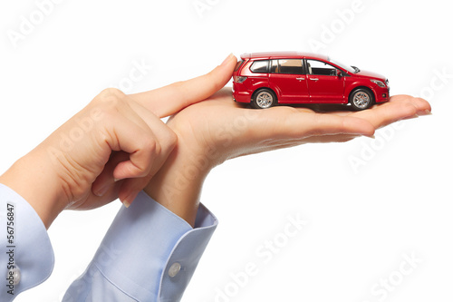 Hand with car.