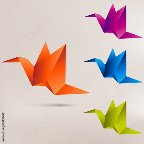 Origami paper bird on abstract background