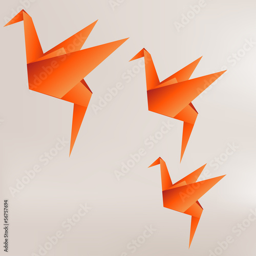 Origami paper bird on abstract background