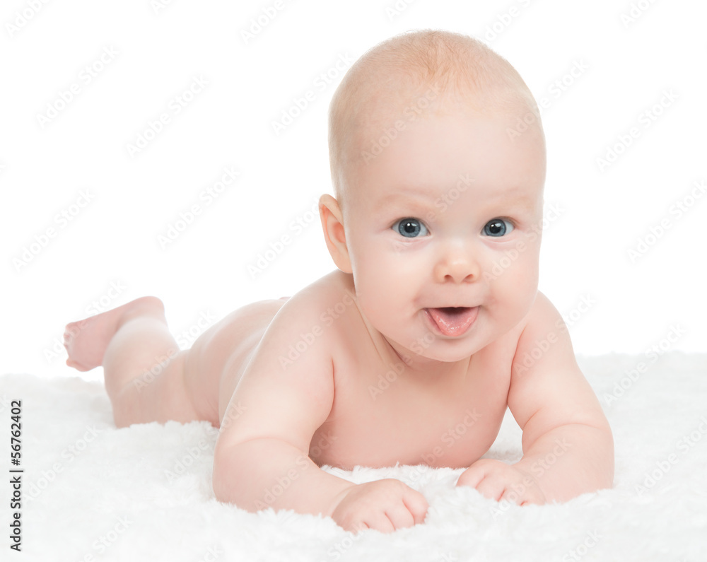 Infant child baby boy lying happy smiling on blanket Infant child baby boy lying happy smiling on blanket
