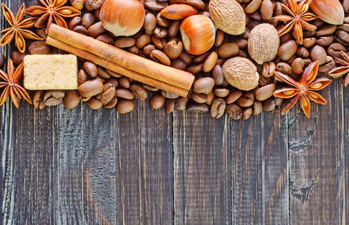 coffee and aroma spice on wooden background