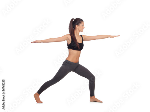 Woman doing stretching exercises in a gym