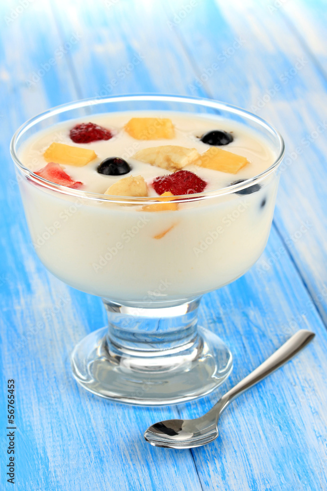 Delicious yogurt with fruit on table close-up Delicious yogurt with fruit on table close-up