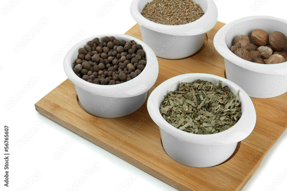 Assortment of spices in white bowls, Assortment of spices in white bowls,