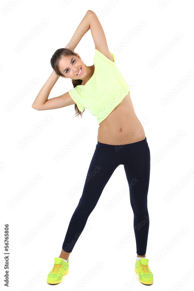 Beautiful young girl doing exercises isolated on white Beautiful young girl doing exercises isolated on white