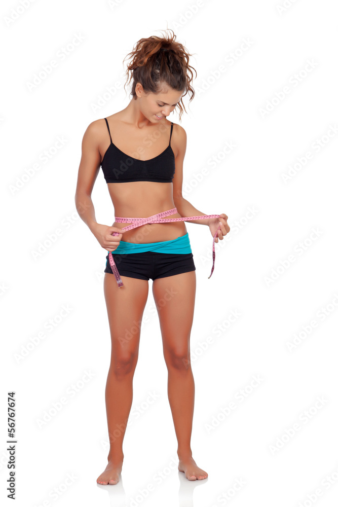 Slim brunette girl with tape measure Slim brunette girl with tape measure