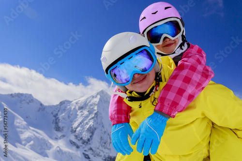 Ski, snow and fun  - family enjoying winter vacation