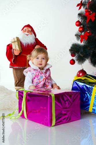 baby with xmas decoration