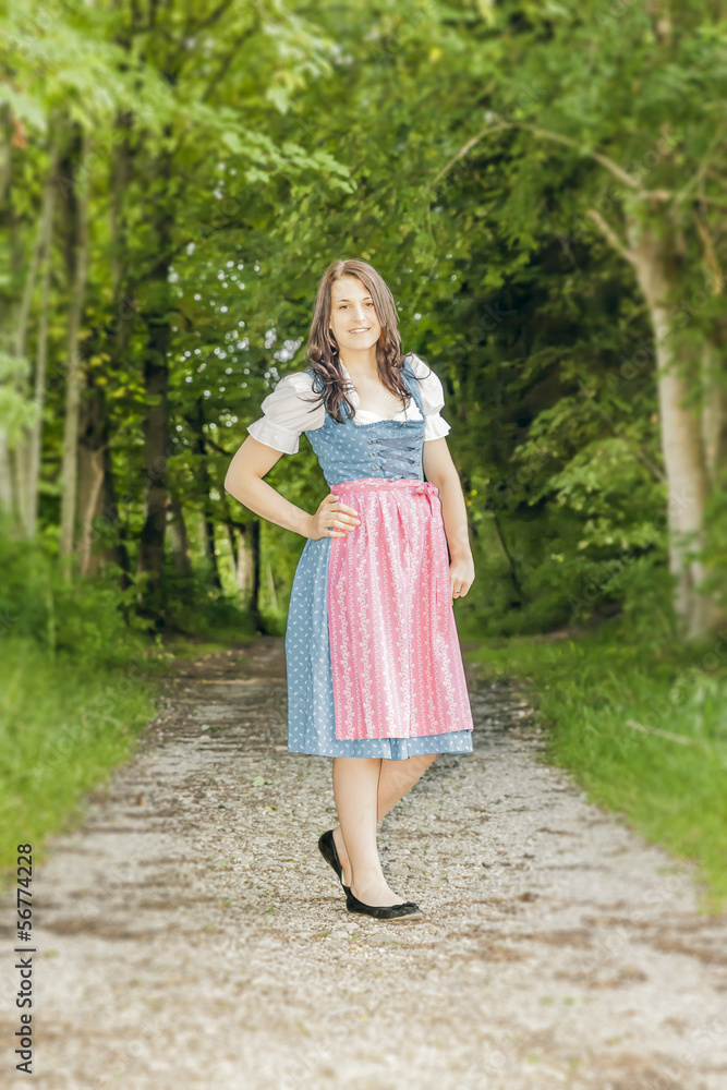 woman in bavarian traditional dirndl woman in bavarian traditional dirndl