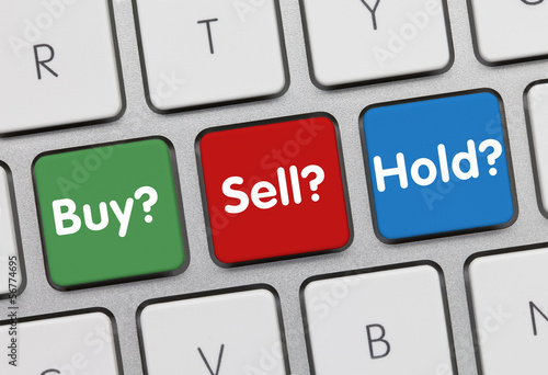 Buy Sell Hold investor keyboard photo