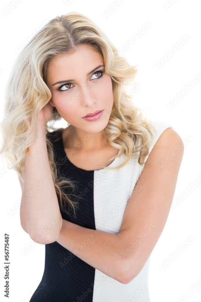 Thoughtful blonde model looking up Thoughtful blonde model looking up