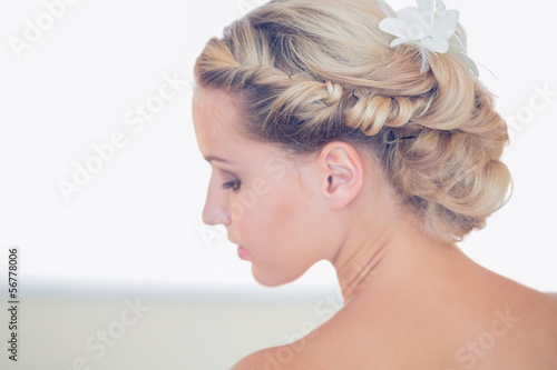 Pretty young bride looking down