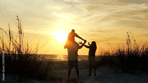 Ethnic Family Beach Sunset Silhouette photo