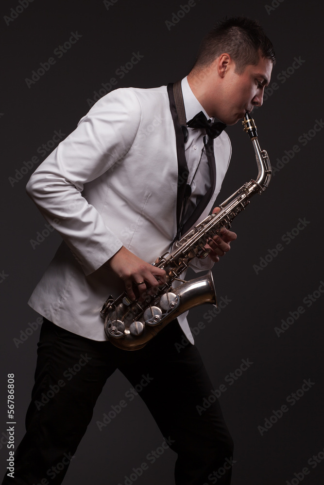Naklejka premium Sax player playing modern music