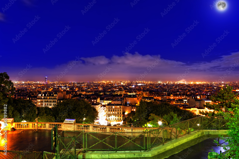 Night view of Paris from the hill of Montmartre.Paris.