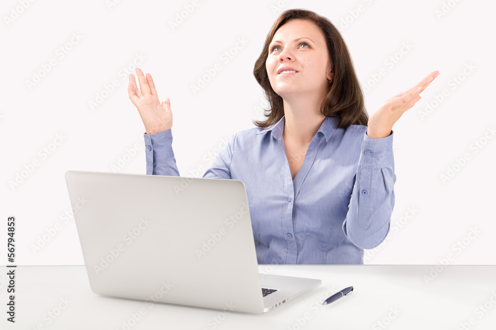 Business woman is sitting in front of a laptop Business woman is sitting in front of a laptop