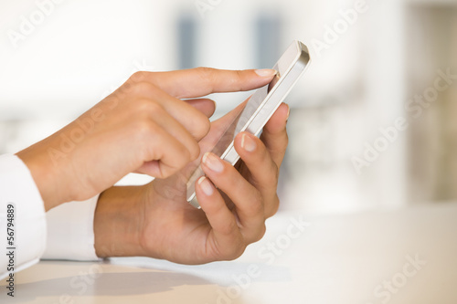 Mobile phone in a woman's hand isolated, sms,message