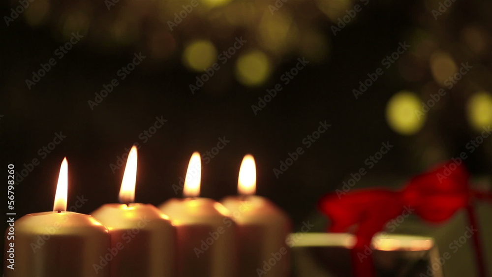 Christmas candles burning in a loop Stock Video Adobe Stock