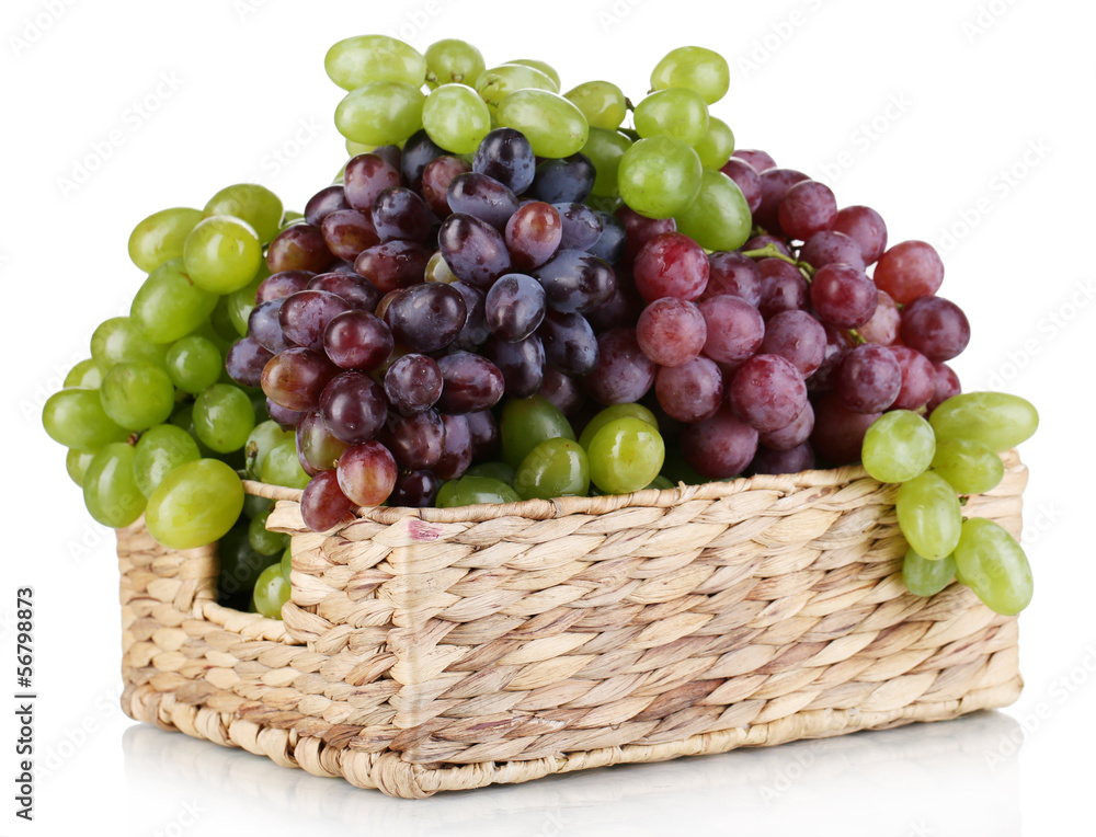 Ripe green and purple grapes in basket isolated on white Ripe green and purple grapes in basket isolated on white