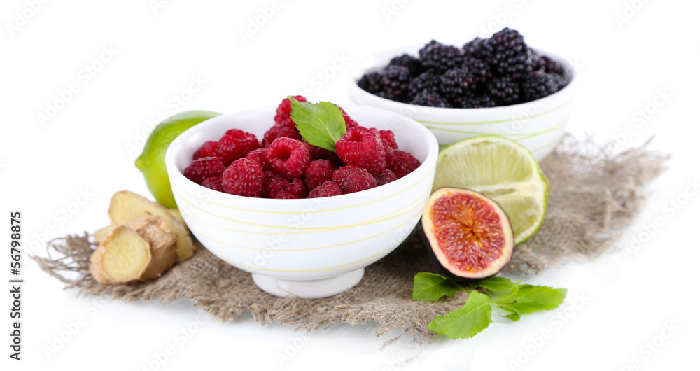 Raspberries and blackberry in small bowls Raspberries and blackberry in small bowls