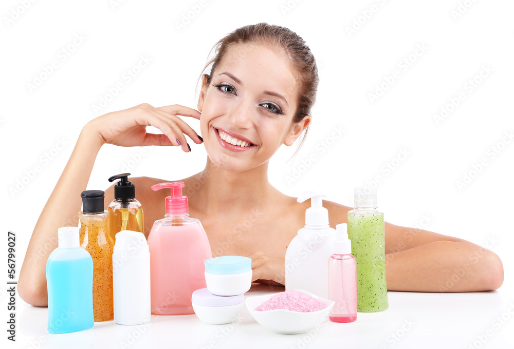 Beautiful girl with cosmetics close-up isolated on white Beautiful girl with cosmetics close-up isolated on white
