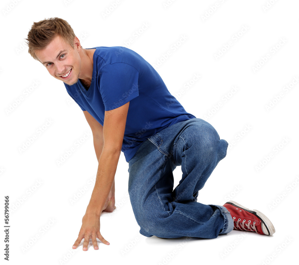 Handsome young man dancing isolated on white Handsome young man dancing isolated on white