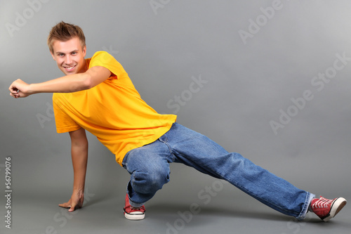 Handsome young man dancing ...