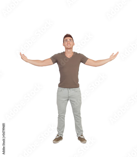 Casual young man looking up with arms extended © Gelpi