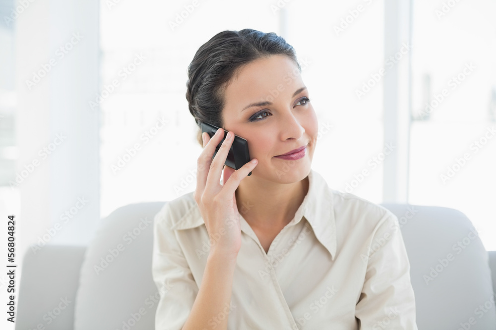 Content stylish brunette businesswoman making a phone call Content stylish brunette businesswoman making a phone call