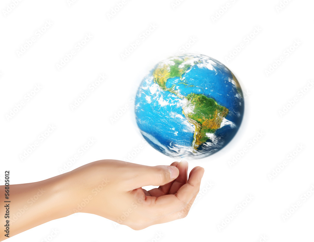 earth in human hand against earth in human hand against