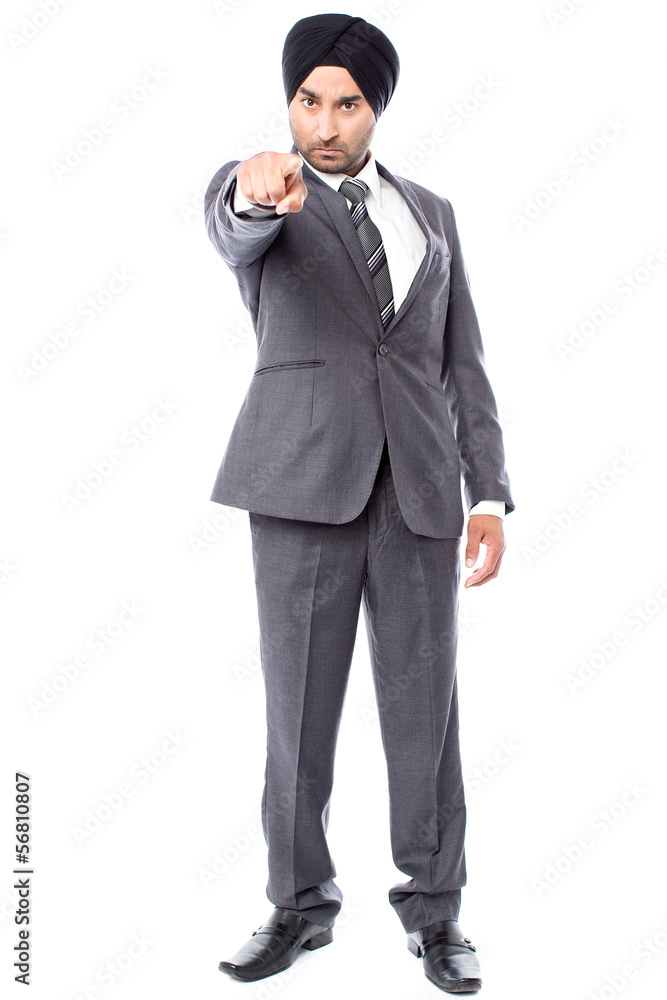 Angry businessman pointing towards you Angry businessman pointing towards you