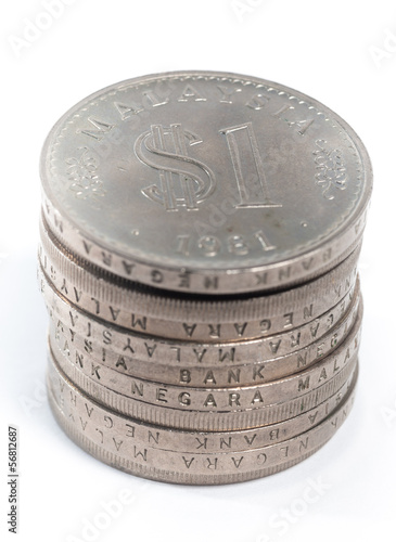 Old Malaysia Coin stacked on a white background photo