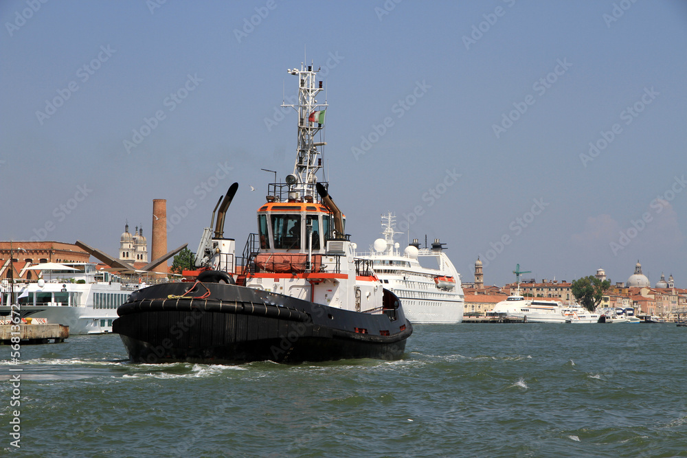 tug boat to bring out from the port the cruise ships