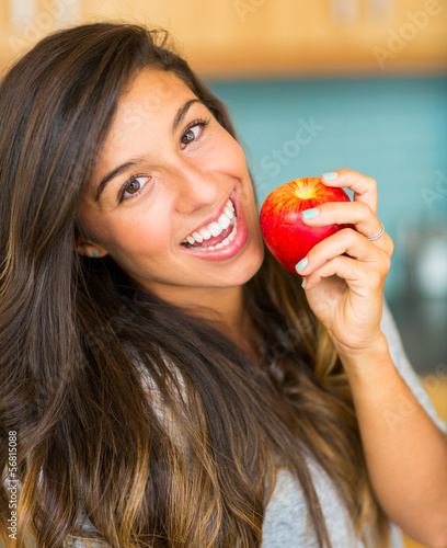 Beautiful Young Woman Holding Red Apple