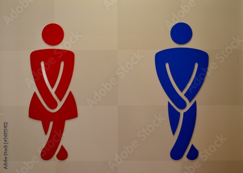 Toilet sign with a man and a woman