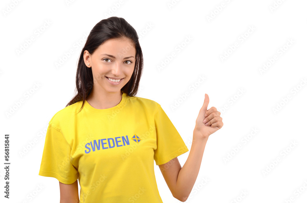 Thumbs up for Sweden.Girl with Sweden flag on her t-shirt Thumbs up for Sweden.Girl with Sweden flag on her t-shirt