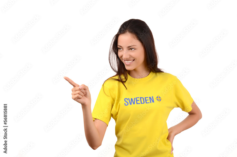 Girl pointing to the side, with Sweden flag on her t-shirt Girl pointing to the side, with Sweden flag on her t-shirt