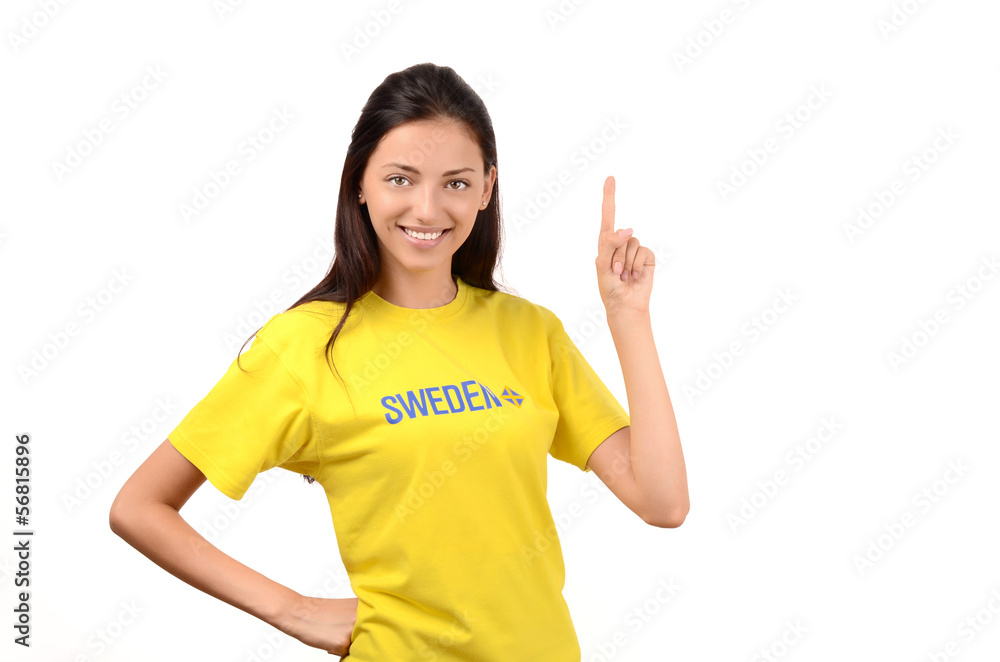 Girl pointing up. Girl with Sweden flag on her t-shirt. Girl pointing up. Girl with Sweden flag on her t-shirt.