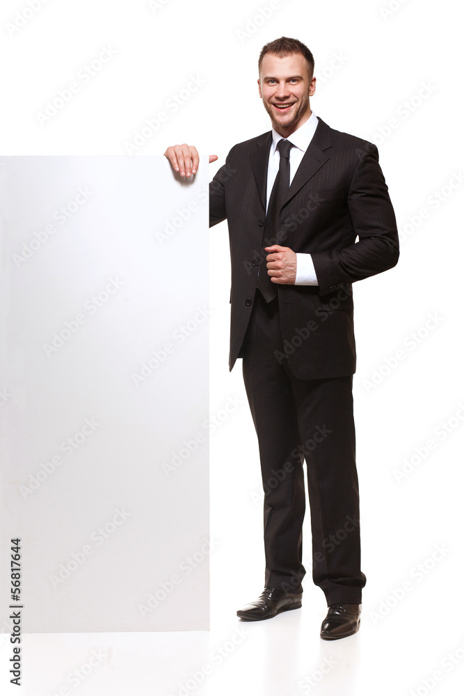 Portrait of business man with blank signboard Portrait of business man with blank signboard