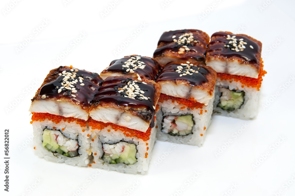 Japanese rolls in a restaurant with fish and vegetables Japanese rolls in a restaurant with fish and vegetables