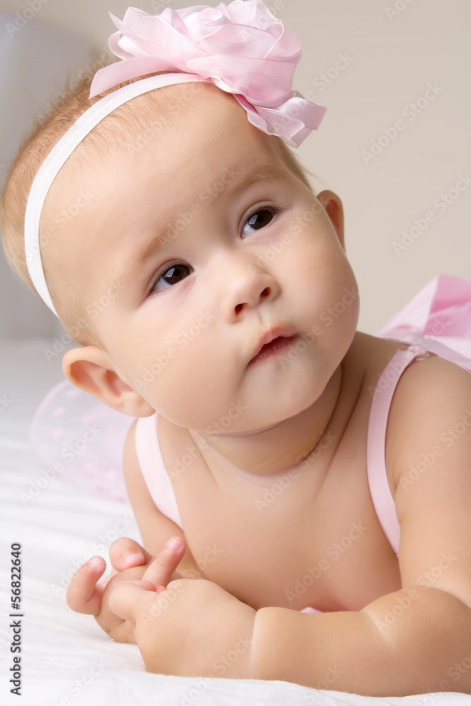Little baby girl in pink dress. Little baby girl in pink dress.