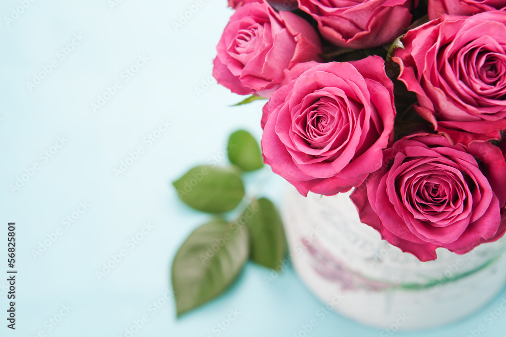 Bouquet of beautiful pink roses on light blue background. Bouquet of beautiful pink roses on light blue background.