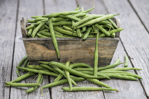 Some Green Beans on wood