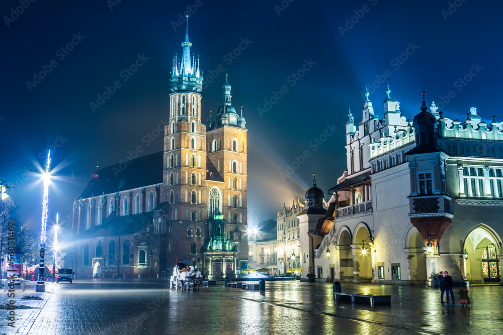 Obraz premium Krakow old city at night St. Mary's Church at night. Krakow Pola
