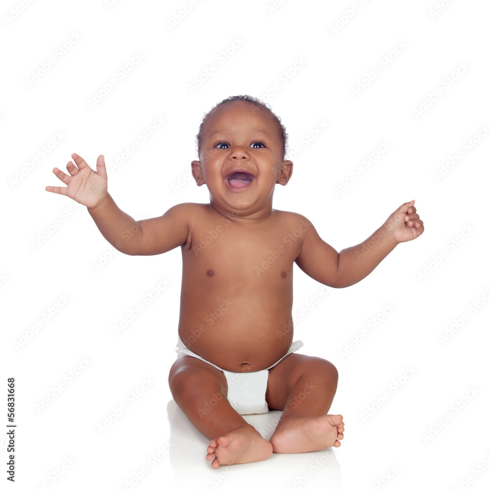 Adorable african baby in diaper sitting on the floor Adorable african baby in diaper sitting on the floor