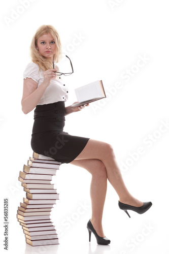 Beautiful young woman with books white background