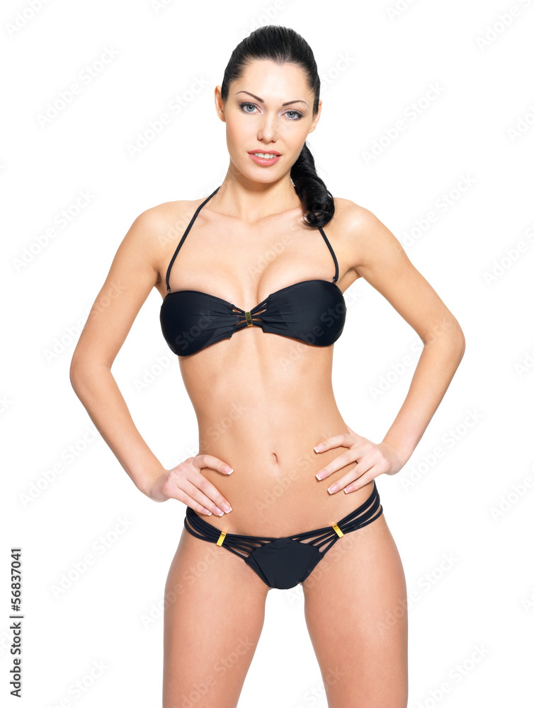 Slim body of young woman in black bikini Slim body of young woman in black bikini