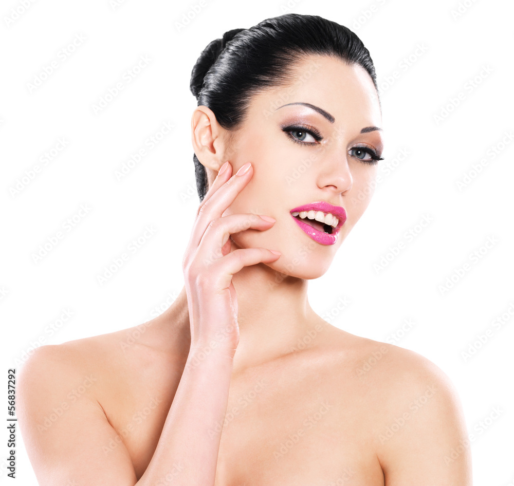 Beautiful expressive woman cares of the skin face Beautiful expressive woman cares of the skin face